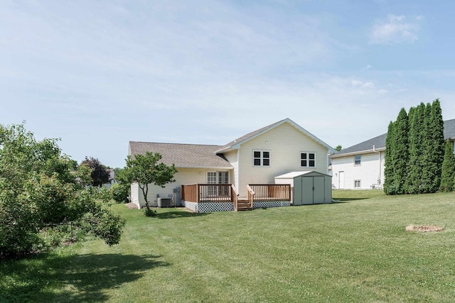 1335 Terapin Trl, Janesville, WI 53545 - back of house featuring a storage unit, a yard, and a deck