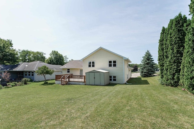 1335 Terapin Trl, Janesville, WI 53545 - back of property featuring a shed, a deck, and a lawn