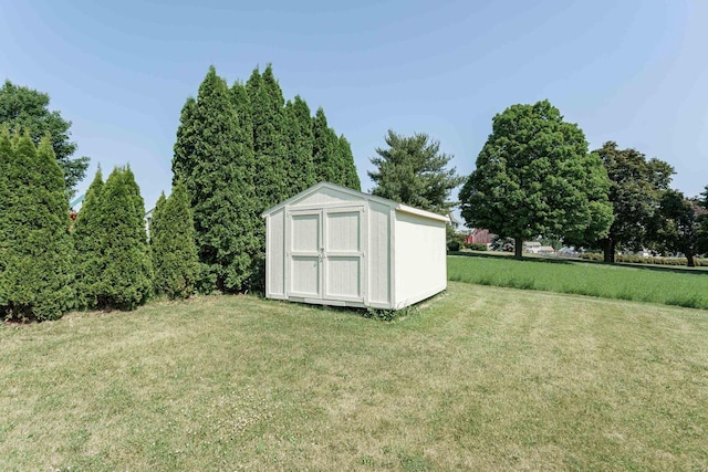 1335 Terapin Trl, Janesville, WI 53545 - view of green lawn featuring a shed