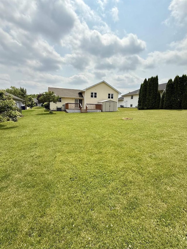 1335 Terapin Trl, Janesville, WI 53545 - view of green lawn with a wooden deck