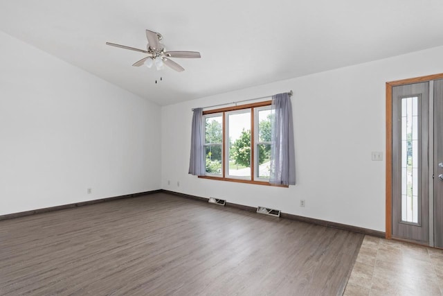 1335 Terapin Trl, Janesville, WI 53545 - spare room featuring wood finished floors, ceiling fan, and lofted ceiling
