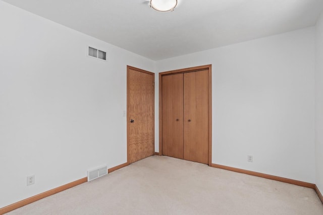 1335 Terapin Trl, Janesville, WI 53545 - unfurnished bedroom with light colored carpet and a closet