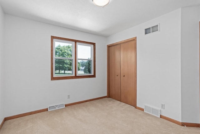1335 Terapin Trl, Janesville, WI 53545 - unfurnished bedroom with carpet flooring and a closet