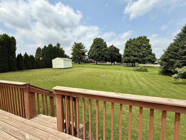 1335 Terapin Trl, Janesville, WI 53545 - view of green lawn featuring a storage unit and a deck