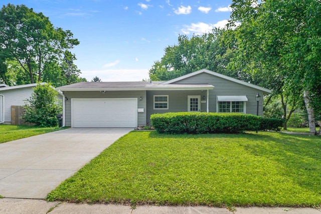 1602 Golden Oak Ln, Madison, WI 53711 - ranch-style house featuring an attached garage, a front yard, and concrete driveway