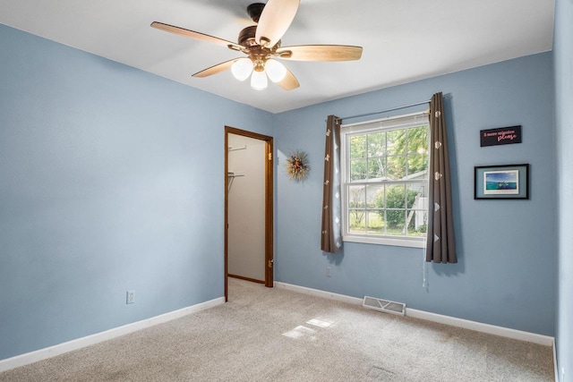 1602 Golden Oak Ln, Madison, WI 53711 - carpeted empty room with a ceiling fan and baseboards