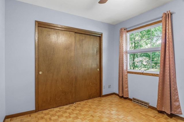 1602 Golden Oak Ln, Madison, WI 53711 - unfurnished bedroom featuring a closet and a ceiling fan