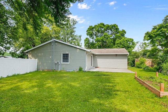 1602 Golden Oak Ln, Madison, WI 53711 - back of house with a patio and a vegetable garden