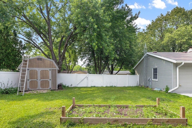 1602 Golden Oak Ln, Madison, WI 53711 - fenced backyard featuring a vegetable garden and a storage unit