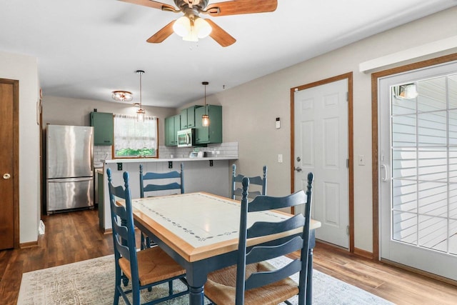 1602 Golden Oak Ln, Madison, WI 53711 - dining room with wood finished floors and ceiling fan