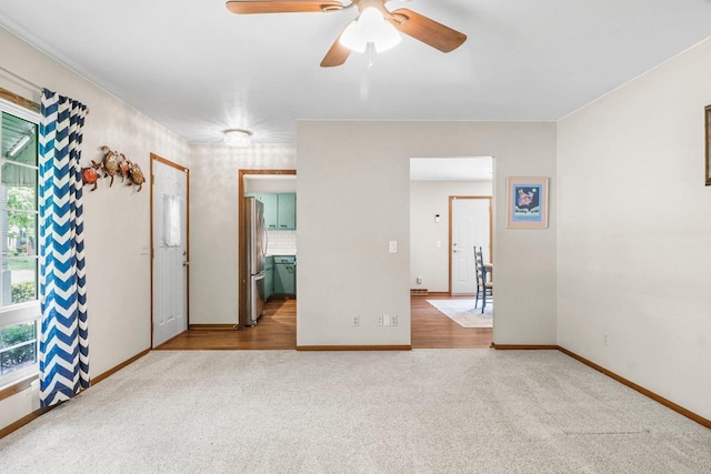 1602 Golden Oak Ln, Madison, WI 53711 - empty room featuring carpet flooring and a ceiling fan