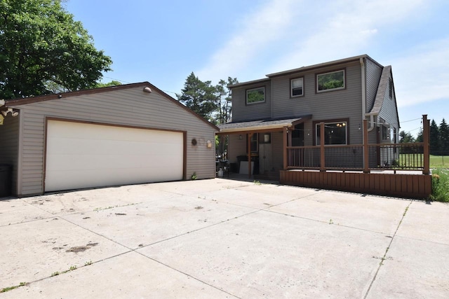 10526 W Congress St, Wauwatosa, WI 53225 - view of front facade with a garage and an outbuilding