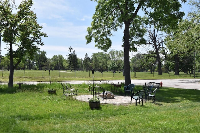 10526 W Congress St, Wauwatosa, WI 53225 - view of community featuring a lawn, an outdoor fire pit, and view of scattered trees