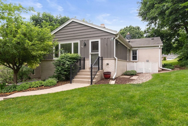1060 Hawthorne Ln, Brookfield, WI 53005 - view of front of property with brick siding and a front lawn
