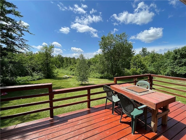 6782 55th St, Chippewa Falls, WI 54729 - wooden deck with a lawn and outdoor dining area