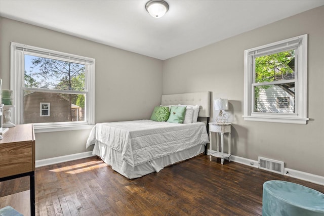 4455 N 58th St, Milwaukee, WI 53218 - bedroom with multiple windows and wood finished floors