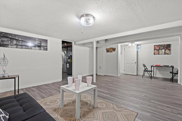 4455 N 58th St, Milwaukee, WI 53218 - living room featuring wood finished floors and a textured ceiling