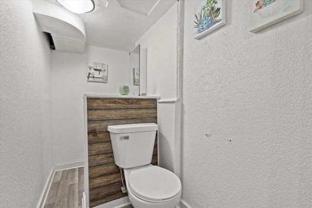 4455 N 58th St, Milwaukee, WI 53218 - bathroom featuring wood finished floors and a textured wall