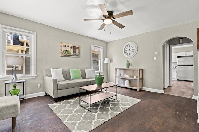 4455 N 58th St, Milwaukee, WI 53218 - living area with ceiling fan, arched walkways, and wood finished floors