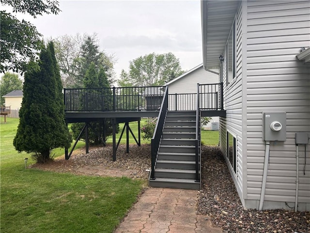 1430 5th Ave, Baldwin, WI 54002 - view of green lawn with a deck and stairs