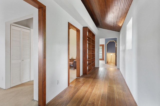210 N 2nd St, Palmyra, WI 53156 - hallway featuring wood ceiling, light wood-style flooring, and built in shelves