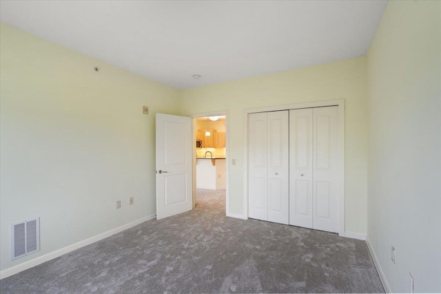 5196 Sassafras Dr Unit 313, Fitchburg, WI 53711 - unfurnished bedroom featuring carpet floors and a closet