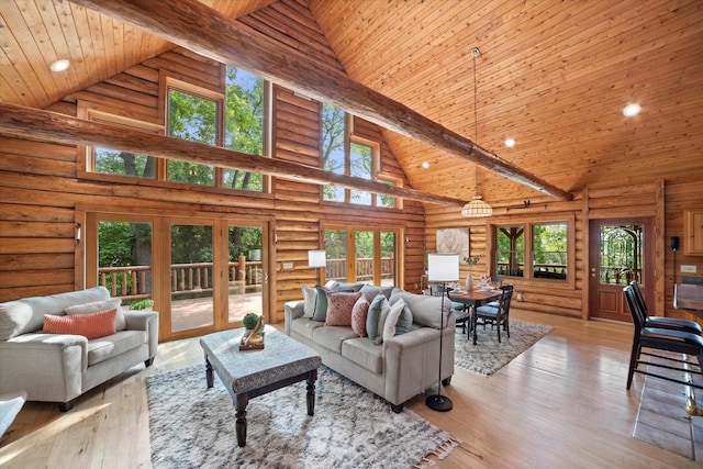 5633 Contour Rd, Waterford, WI 53185 - living area featuring high vaulted ceiling, french doors, rustic walls, hardwood / wood-style flooring, and a wood ceiling with exposed beams