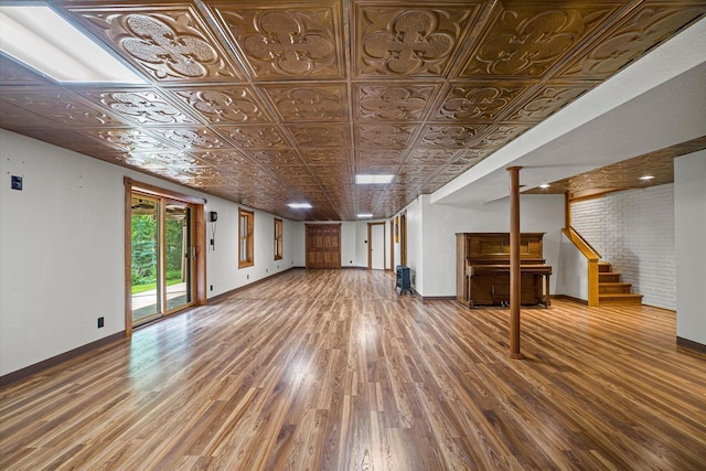 5633 Contour Rd, Waterford, WI 53185 - unfurnished living room featuring wood finished floors, stairs, and an ornate ceiling