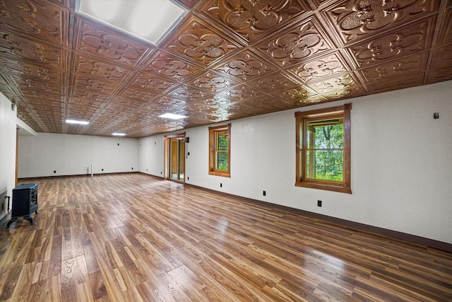 5633 Contour Rd, Waterford, WI 53185 - unfurnished room featuring wood finished floors and an ornate ceiling