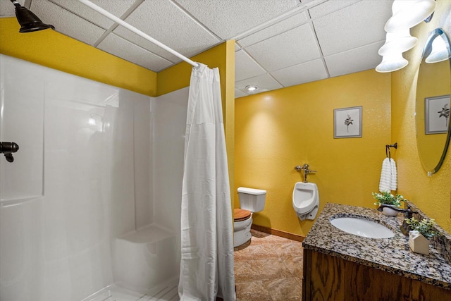 5633 Contour Rd, Waterford, WI 53185 - bathroom with a drop ceiling, vanity, a shower with curtain, and tile patterned floors
