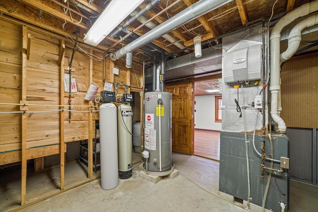 5633 Contour Rd, Waterford, WI 53185 - unfinished basement with gas water heater, a water softener system, and a heating unit