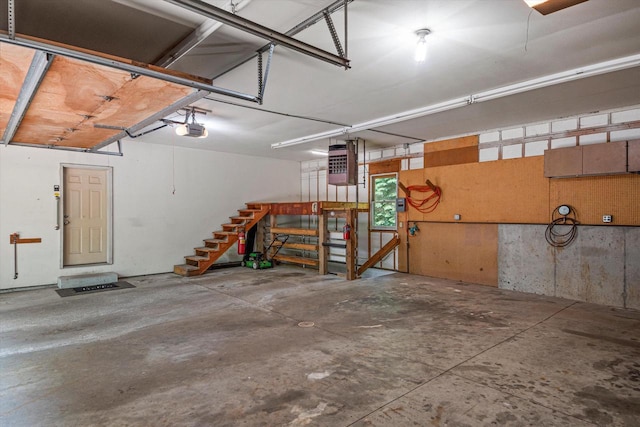 5633 Contour Rd, Waterford, WI 53185 - garage with a garage door opener and a heating unit