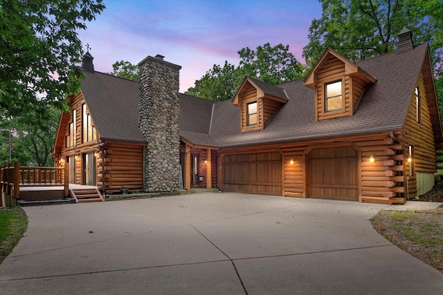 5633 Contour Rd, Waterford, WI 53185 - cabin featuring driveway, log exterior, and a chimney