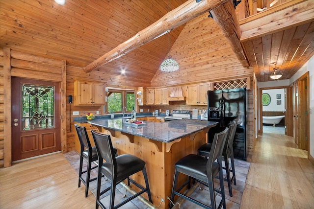 5633 Contour Rd, Waterford, WI 53185 - kitchen featuring black fridge, electric stove, light wood finished floors, a wood ceiling with exposed beams, and light brown cabinets