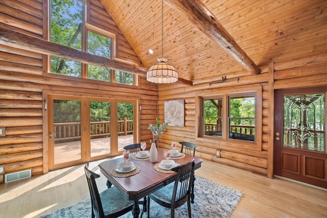 5633 Contour Rd, Waterford, WI 53185 - dining room with high vaulted ceiling, rustic walls, wooden ceiling, hardwood / wood-style floors, and french doors