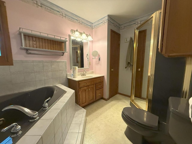N72W14281 Good Hope Rd, Menomonee Falls, WI 53051 - bathroom featuring vanity, a tub with jets, and a shower stall