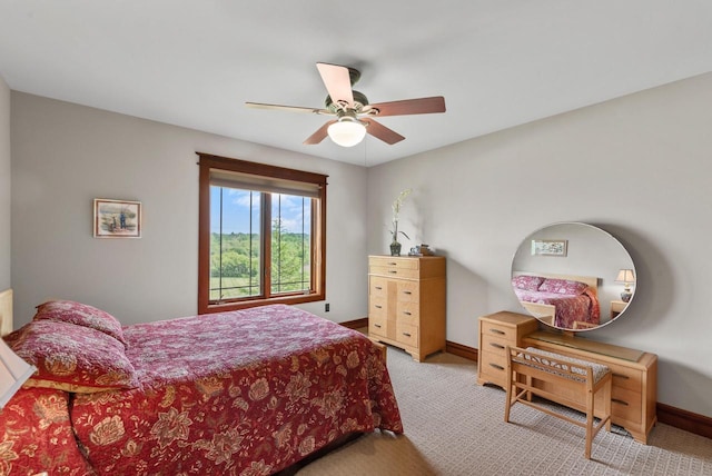4570 Stoney Creek Rd, West Bend, WI 53095 - bedroom with light carpet and ceiling fan