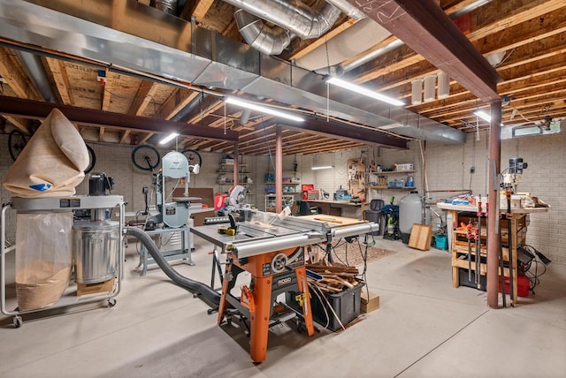 4570 Stoney Creek Rd, West Bend, WI 53095 - unfinished basement featuring a workshop area and brick wall