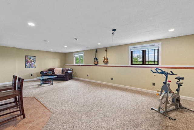 4570 Stoney Creek Rd, West Bend, WI 53095 - workout area with light colored carpet, recessed lighting, and light tile patterned floors