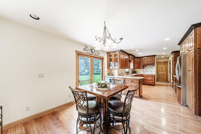 14240 Radiant Ct, Brookfield, WI 53005 - dining room featuring light wood-style floors, a chandelier, and recessed lighting