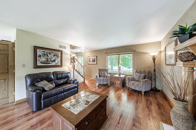 14240 Radiant Ct, Brookfield, WI 53005 - living area with light wood-style floors and stairs