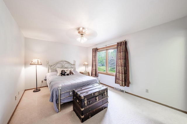 14240 Radiant Ct, Brookfield, WI 53005 - carpeted bedroom with baseboards and a ceiling fan