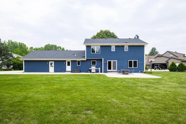 14240 Radiant Ct, Brookfield, WI 53005 - rear view of property with a patio area and a lawn