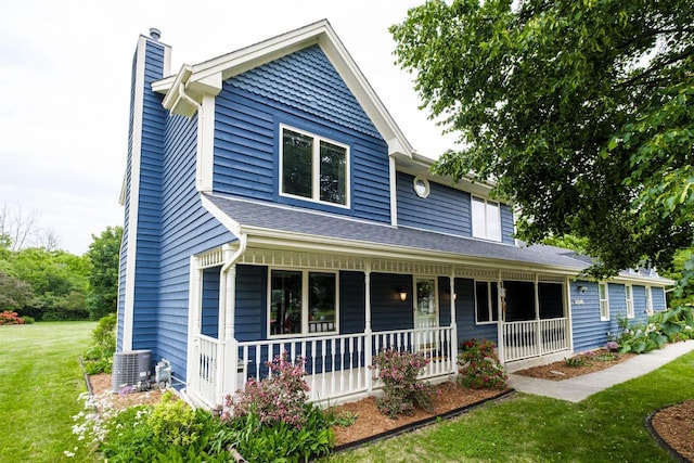 14240 Radiant Ct, Brookfield, WI 53005 - view of front facade with a porch, a front yard, and a chimney