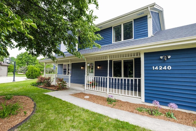 14240 Radiant Ct, Brookfield, WI 53005 - view of front of house featuring a porch, a front yard, and a shingled roof