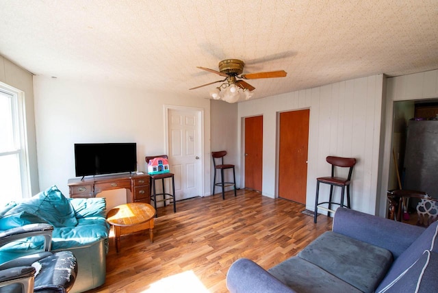 2110 54th St, Kenosha, WI 53140 - living room featuring wood finished floors and ceiling fan
