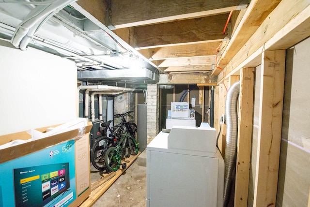 2110 54th St, Kenosha, WI 53140 - unfinished basement featuring washing machine and dryer