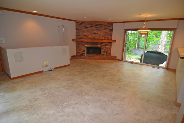3333 N 12th St, Wausau, WI 54403 - unfurnished living room featuring crown molding and a brick fireplace