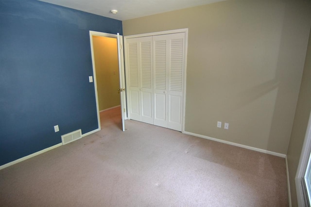 3333 N 12th St, Wausau, WI 54403 - unfurnished bedroom featuring a closet and carpet flooring