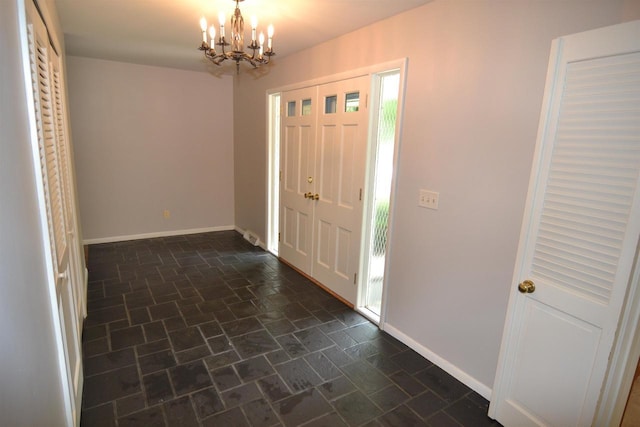 3333 N 12th St, Wausau, WI 54403 - entrance foyer featuring a chandelier and stone tile flooring